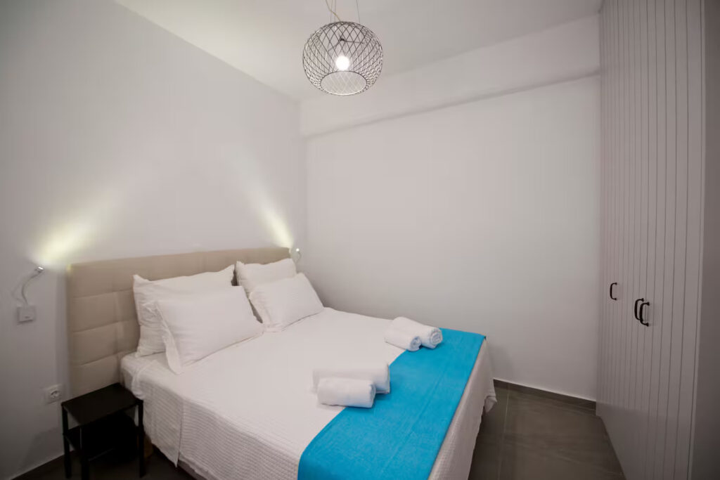 Primary bedroom with double bed in Mykonos